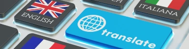 Tastatur mit dem Wort Translate und einer Auswahl an verschiedenen Länderfahmen